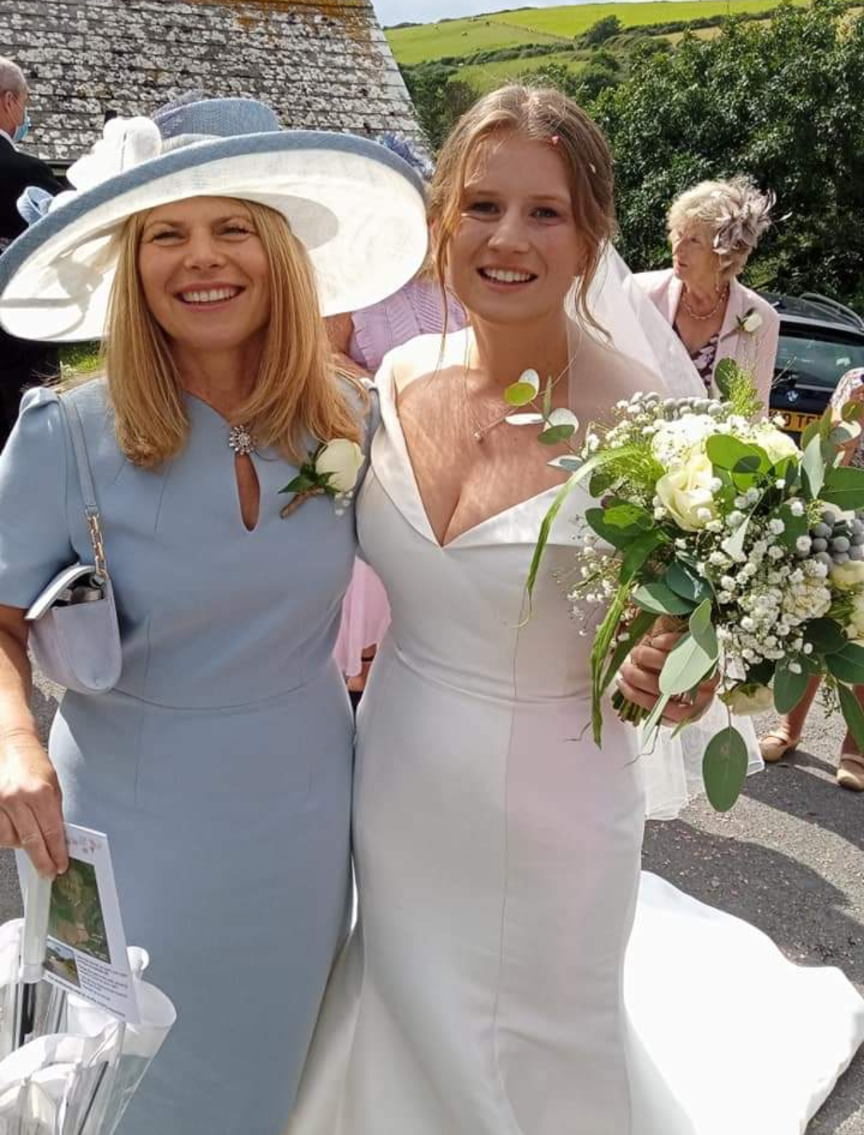 Wedding bride and mother of bride wearing a hat by Samantha Patrick Millinery